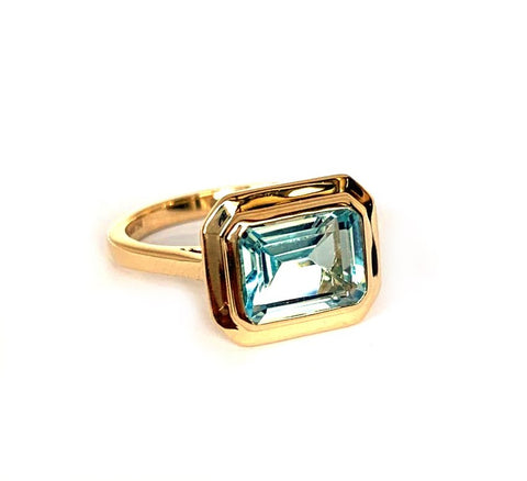 14K emerald cut blue topaz earring surrounded by turquoise & small brilliant diamonds ME2433ybt